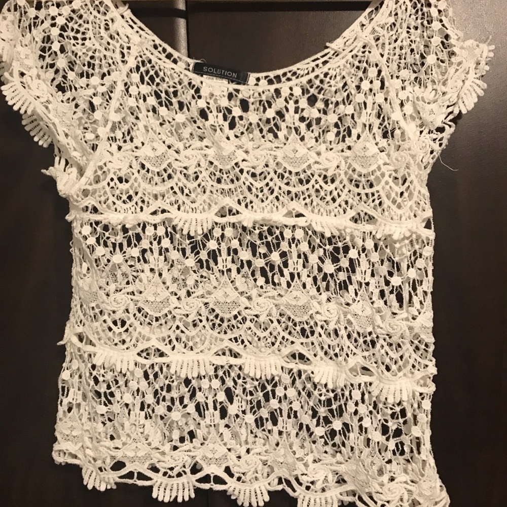 Crotchet white cover up top.